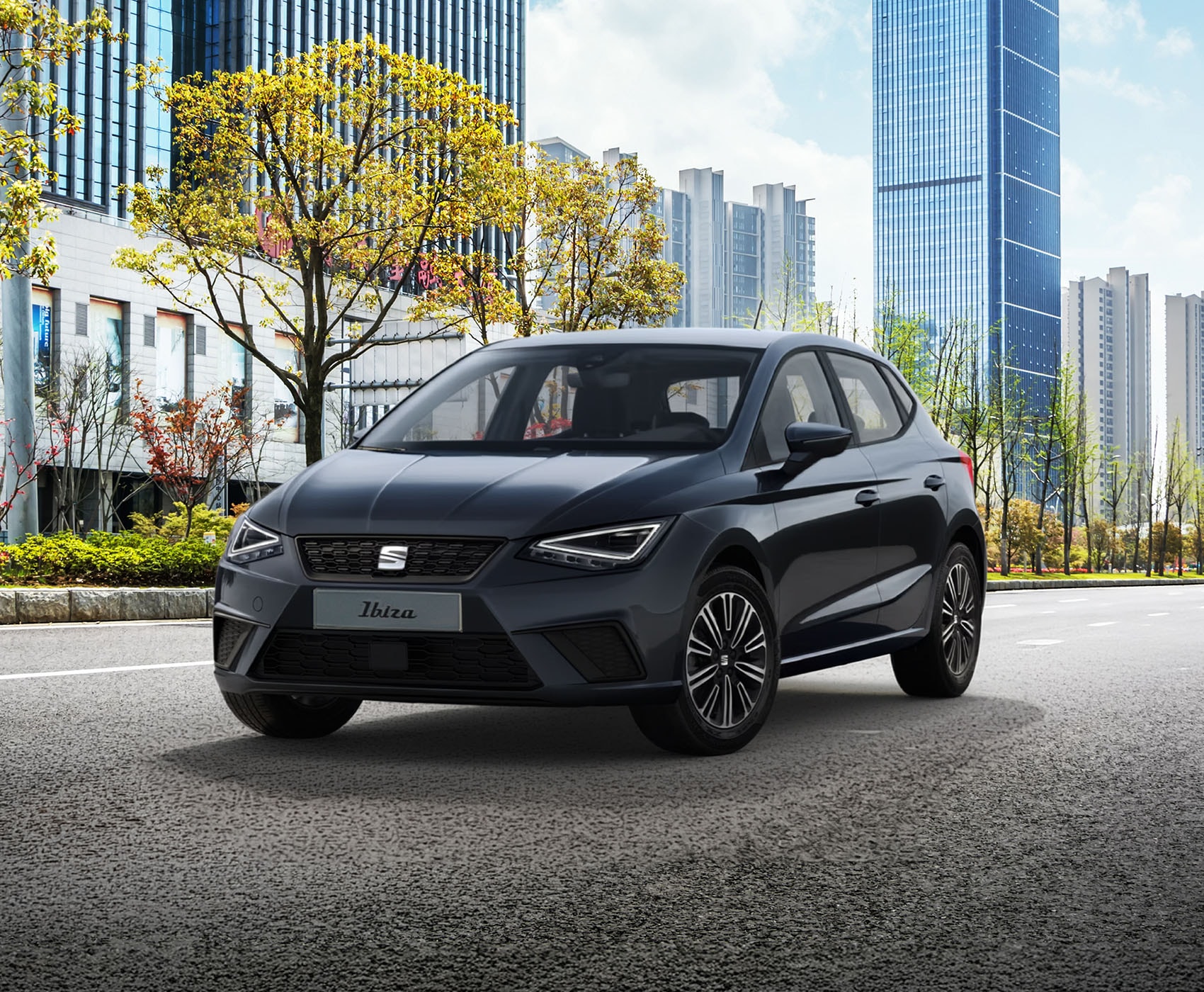 Vista completa de un SEAT Ibiza 2026 de color rojo, aparcado al aire libre