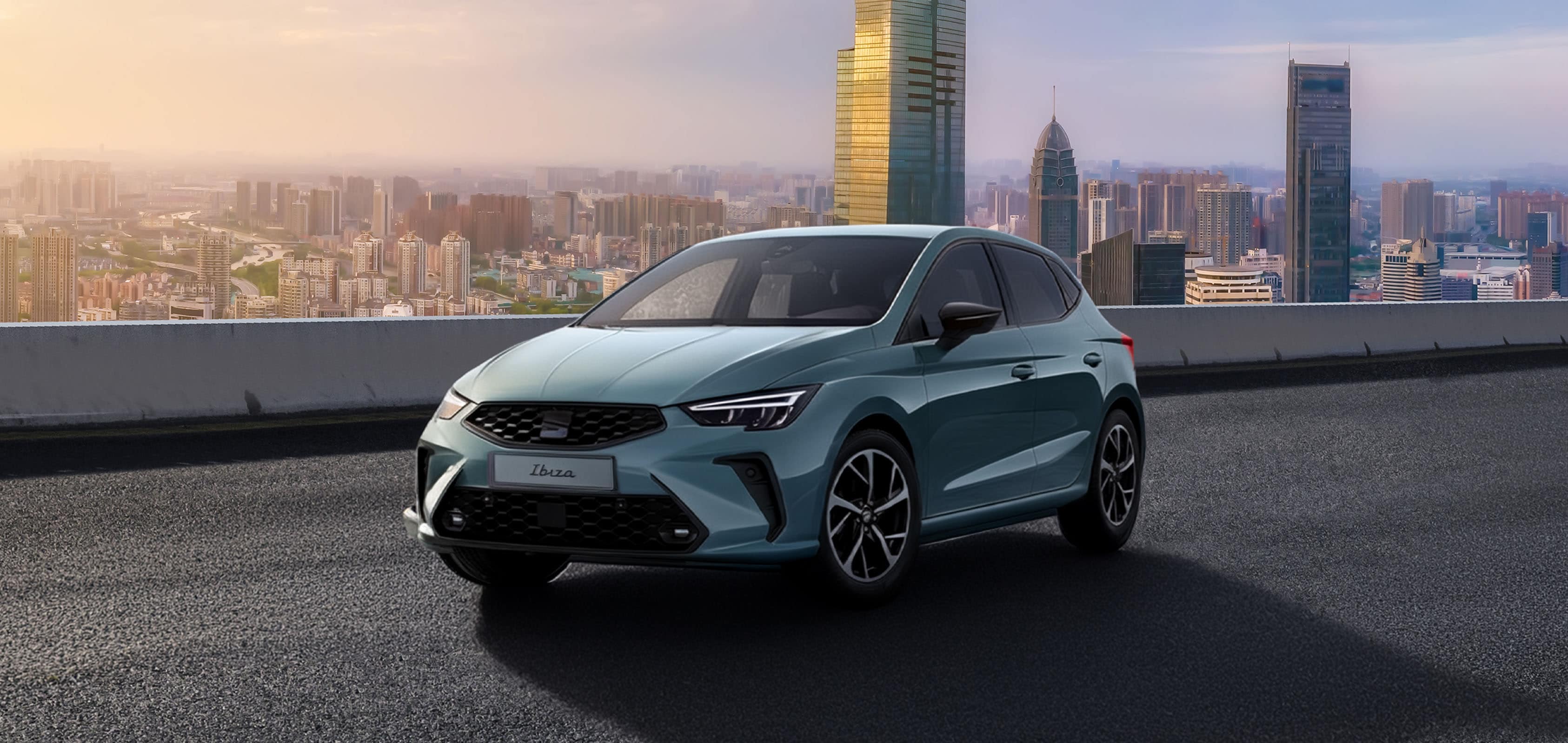 Vista completa de un SEAT Ibiza 2026 de color rojo, aparcado al aire libre